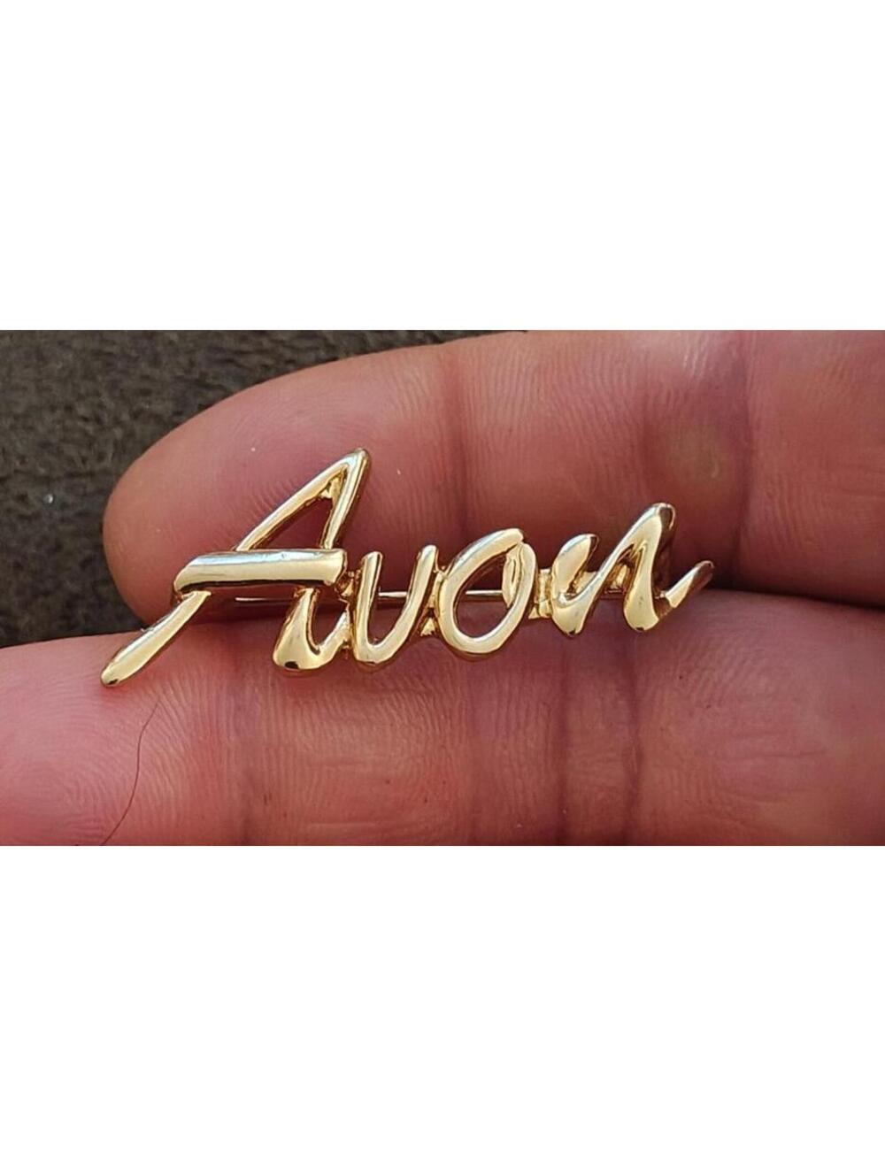 1980s/90s  Avon Gold Tone Cursive Logo Pin